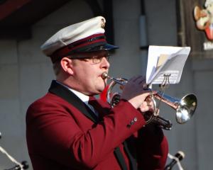 Jonathan Sherwood performs the Last Post in front of The Great War Memorial yesterday as part of...