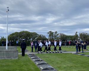 The posy laying ceremony at Anderson’s Bay Cemetery begins with a slow march-on by members of the...