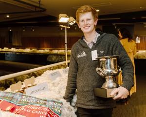 Shane Sanders, from Little Valley Station, and the winning fleece in the Child Cancer Foundation...