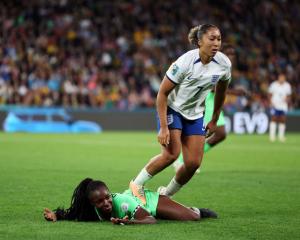 Lauren James stamps on Michelle Alozie, for which she was given a red card. Photo: Getty Images 