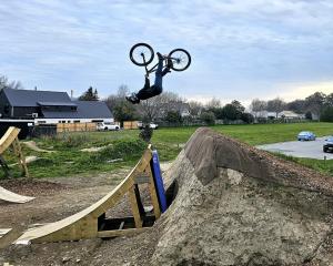 Erik Williams shows off his skills on the new jumps crafted by the three friends. PHOTO: DANIEL...