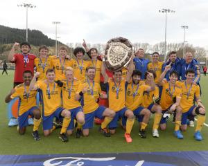 Otago players celebrate their victory in the National Hockey Championship in Dunedin last year....