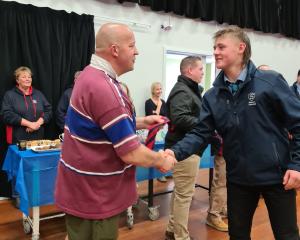 Dave Kempton, seen here congratulating Shaun when he was awarded his Selwyn Schools’ honours tie...