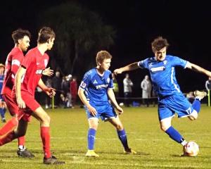 Eddie Wilkinson prepares to put boot to ball in Christchurch United’s 5-0 win over FC Twenty 11....