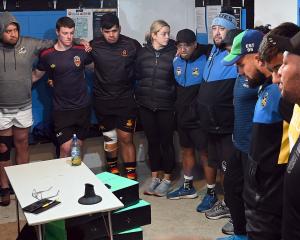 The Otago Whalers have a team talk before a training session at the Kaikorai Rugby Football Club...