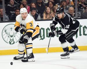 Jack Johnson (left) playing for the Pittsburgh Penguins in this file photo: Photo: Getty Images