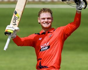 South Australia batter Jake Fraser-McGurk celebrates bringing up his 29-ball century against...