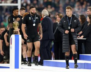 All Blacks captain leads the team as they receive their silver medals. Photo: Getty Images 