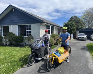 Jamie and Kath Lang sold a car and bought electric cargo bikes to commute around the city. Jamie...