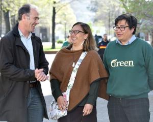 Taieri candidate Scott Willis, co-leader Marama Davidson — with her newly-purchased Dunedin...