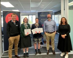 At the presentation of the Polson Higgs innovation competition are (from left) Tom Hanning, Zoe...