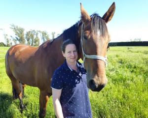 Katie Cox with Spy Da Moment, which she has driven in all of its six wins. Cox was diagnosed in...