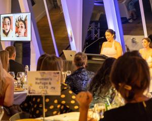 Domestic abuse survivor Gennady Sharpe speaks at the Awards &amp; Gala for Women’s Refuge...