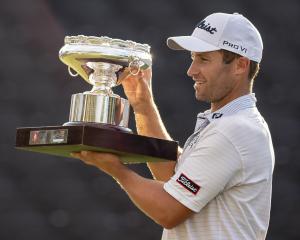  Ben Campbell of New Zealand poses for photo with trophy after winning the final round of the...