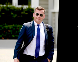 David Seymour leaving a meeting at Christopher Luxon's house today. Photo: RNZ 