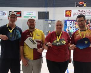 Pickleball Gore players (from left) Dan Winkel and Kieran Lloyd, who won, and Dee Ormsby and...