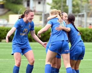 Southern United players celebrate after scoring a goal against Waterside Karori at Logan Park....