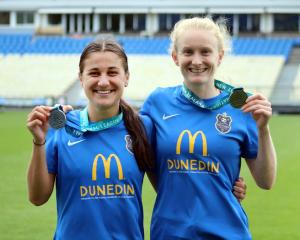 Rose Morton (left) and Hannah Mackay-Wright celebrate with their silver medals after the National...