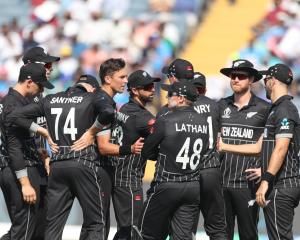 The Black Caps celebrates a wicket during Wednesday's match against South Africa in Pune, India....