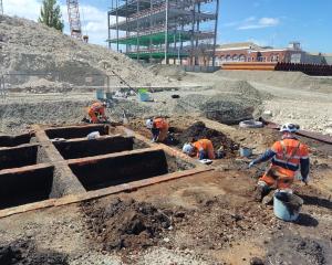 Archaeologists excavate the remains of 12 brick tanning pits at the new Dunedin hospital site...