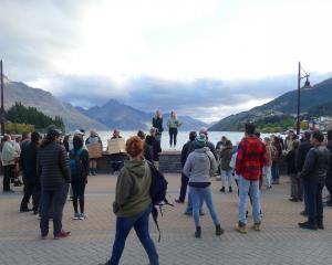 About 100 people gathered at Queenstown’s lakefront, earlier this year, to demand urgent action...