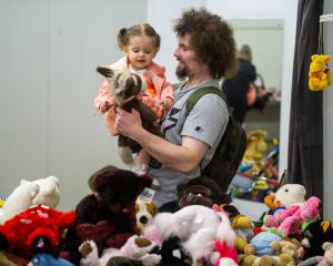 Dylan Cameron and Aria-Jayde Cameron (1) search the soft toys at the Oamaru Toyarama. PHOTO:...