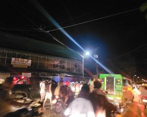 People evacuate buildings in Hinatuan, Surigao del Sur, Philippines following the earthquake....
