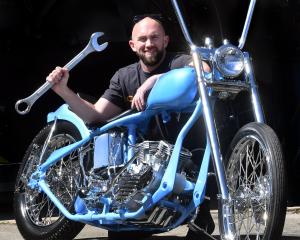 Andrew Martin with his 1948 Harley-Davidson panhead chopper which is a finalist in the Born Free...