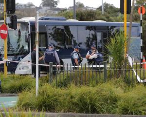 Police are investigating after the fatal accident at Albany Bus Station this afternoon. Photos: NZME