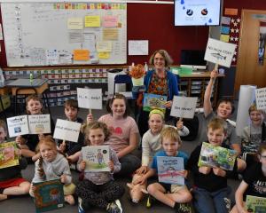 Otama School pupils spend time with author Jennifer Somervell, who read them stories and told...