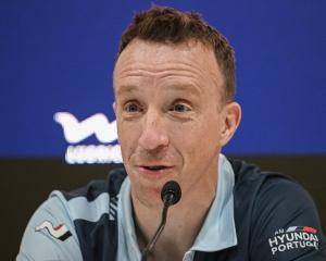 Kris Meeke speaks at a press conference before a World Rally Championship event earlier this year...