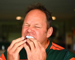 Former All Black Josh Kronfeld wears and tests a Prevent Biometrics mouthguard which measures the...