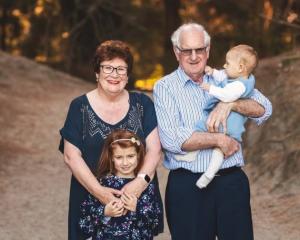 David Biddick, who died of brain cancer on November 30, with his wife Elizabeth Biddick and...