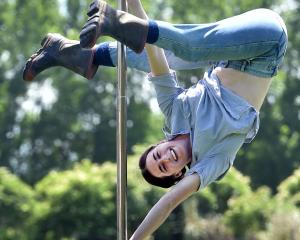 Shannon Miller shows the skills which won her a national pole performer title. PHOTO: PETER MCINTOSH