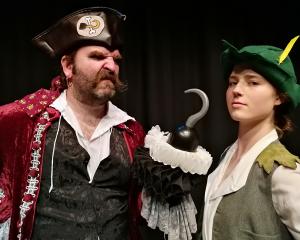 Comedic escapades ...  Peter Pan (Penelope  Hare) and Captain Hook (Calum  Beck) in the Globe...