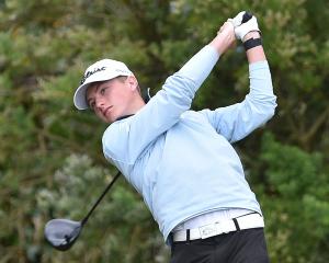 Cooper Moore tees off at the 10th hole during the Otago strokeplay at Balmacewen yesterday. PHOTO...