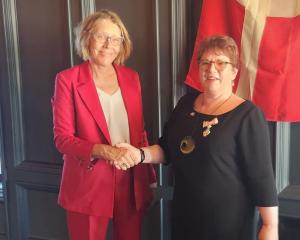 Danish ambassador for Australia and New Zealand Pernille Kardel (left) congratulates former Gore...