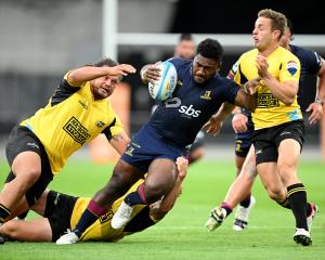 Highlanders winger Timoci Tavatavanawai charges forward during the his side’s Super Rugby Pacific...