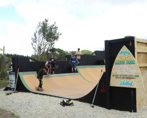 Young Hampden skateboarders test out their new halfpipe last weekend. PHOTO: NIC DUFF
