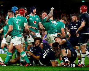 Ireland's Andrew Porter celebrates scoring their second try against Scotland. Photo: Reuters