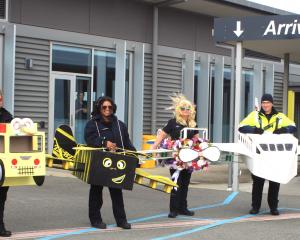 Touching down for a brief landing at the Invercargill Airport arrivals area yesterday during...