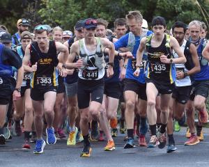 Competitors set off at the start of the Three Peaks race at the Woodhaugh Gardens yesterday...
