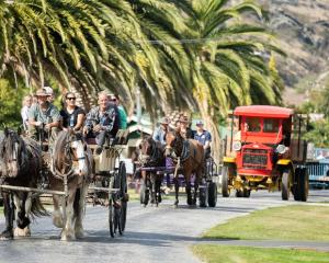 Stu Moore, of Dunedin, left, Shontal Tumai, of Roxburgh, and Colin Moore, of Australia, lead the...