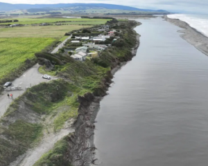 An aerial view of Bluecliffs, perched next to the Waiau River and ocean. The small Southland...