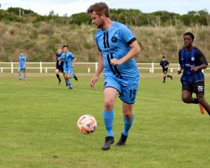 Connor Neil holds the ball for the Dunedin City Royals in their preseason game against Selwyn at...