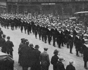 The crew of HMS Chatham march up Princes St, Dunedin. — Otago Witness, 25.3.1924