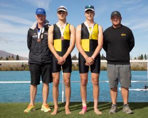 Standing on the podium following their bronze medal in the boys under-18 novice double sculls are...