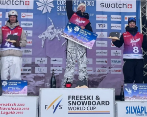 Luca Harrington (R) on the podium at the Freeski World Cup in Switzerland, 2024. Credit: Snow...