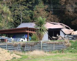 The house severely damaged by a suspicious fire in Waikaia. PHOTO: SANDY EGGLESTON