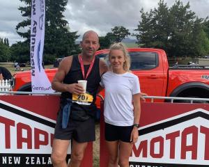 John Fry and daughter Ella after last year’s Motatapu Trail Marathon race. PHOTO: ODT FILES